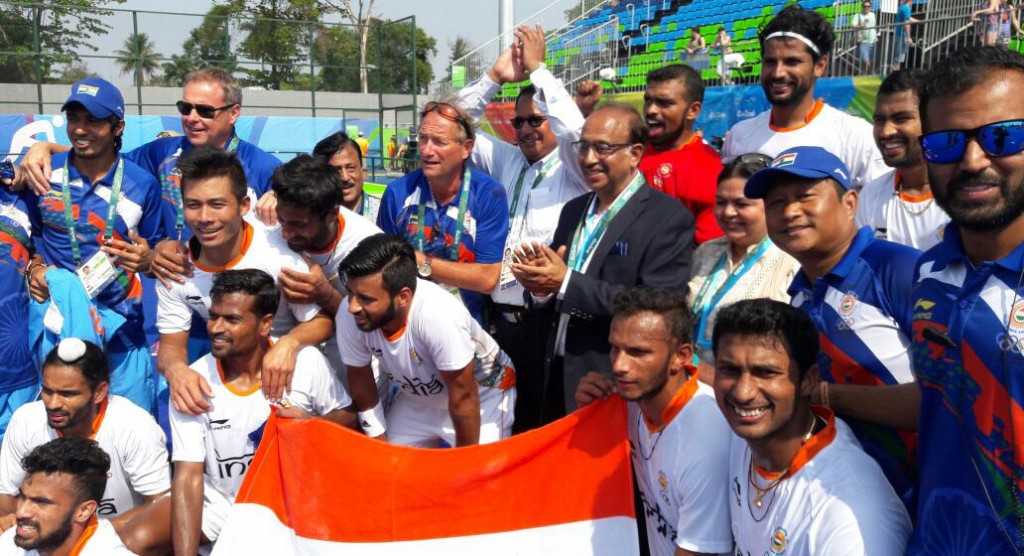 Sports Minister Vijay Goel celebrating with members of Indian Hockey Team, after their victory over Argentina, at Olympics 2016 at Rio, Brazil on Aug 09, 2016