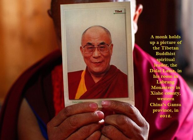 Arrested twice for possessing Dalai Lama photo